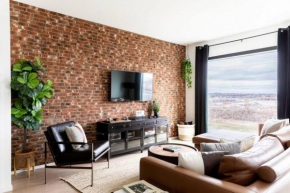 Stunning River View Condo Walk to Downtown Rooftop Patio
